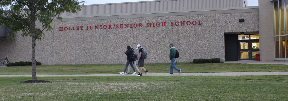 students walking into school