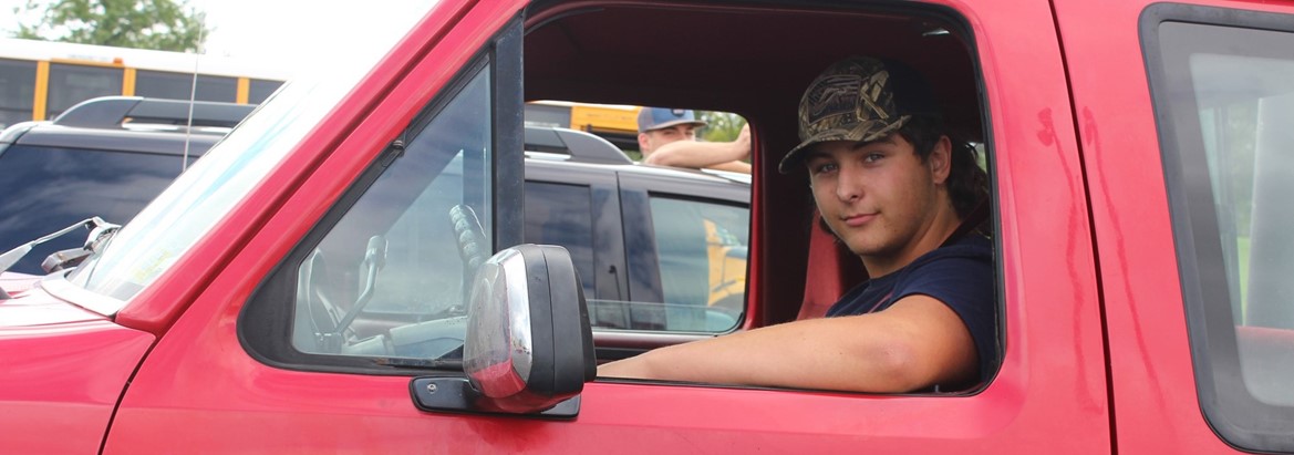 boy in truck