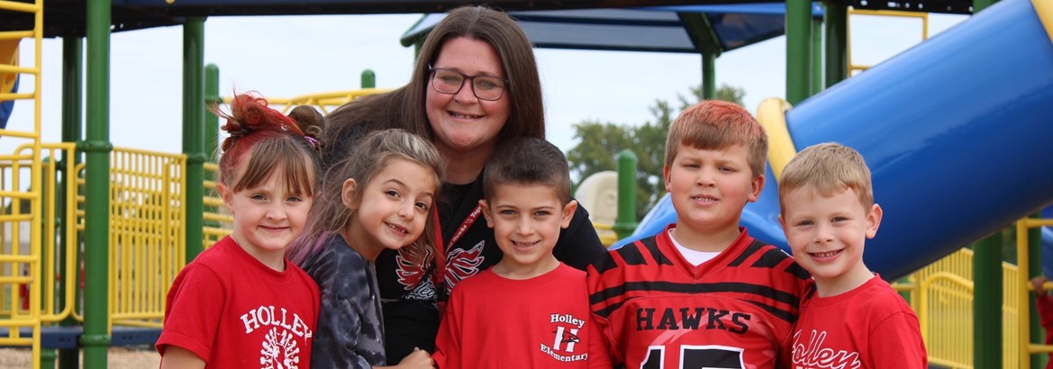 students smiling on playground