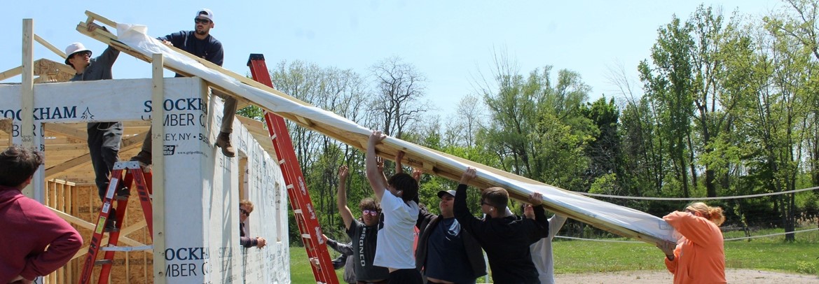 students building shed