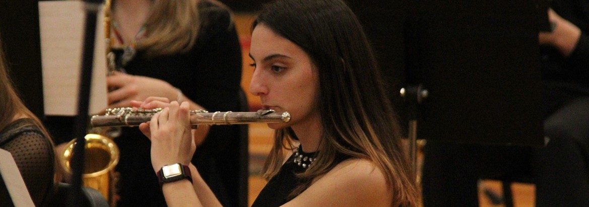 student playing flute