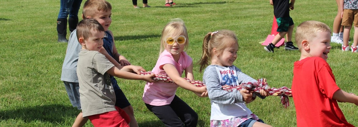 students playing tug of war