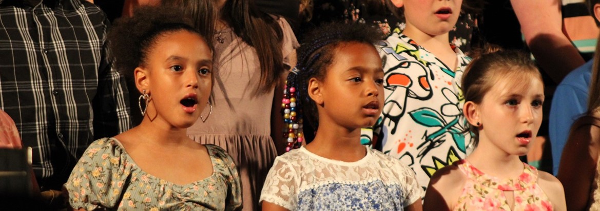 students singing in choir