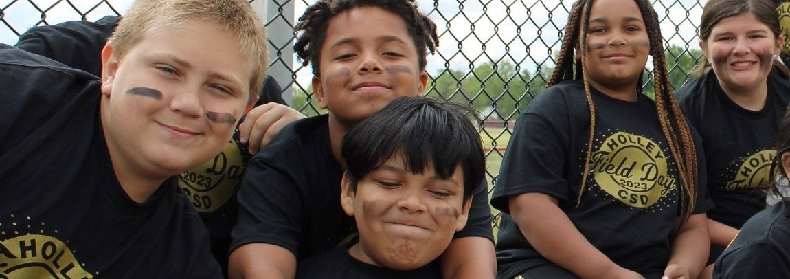students smiling at field day