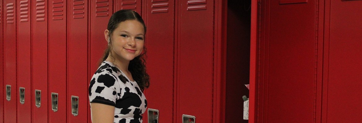 student at locker