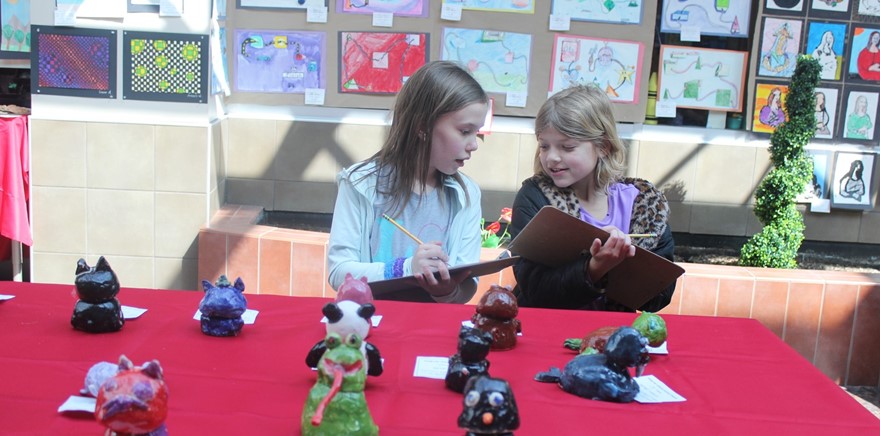 students looking at artwork